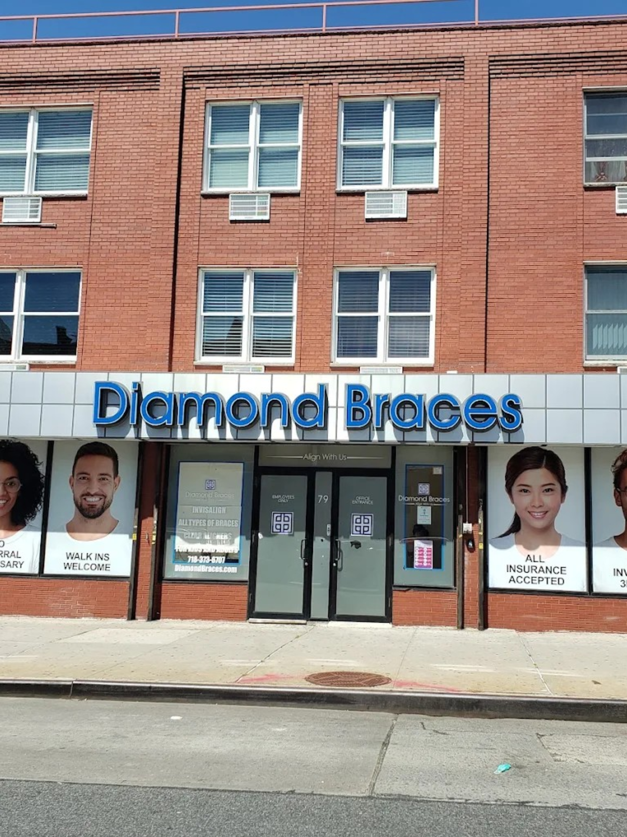 Diamond Braces dental office in New York city with promotional posters on a city street.