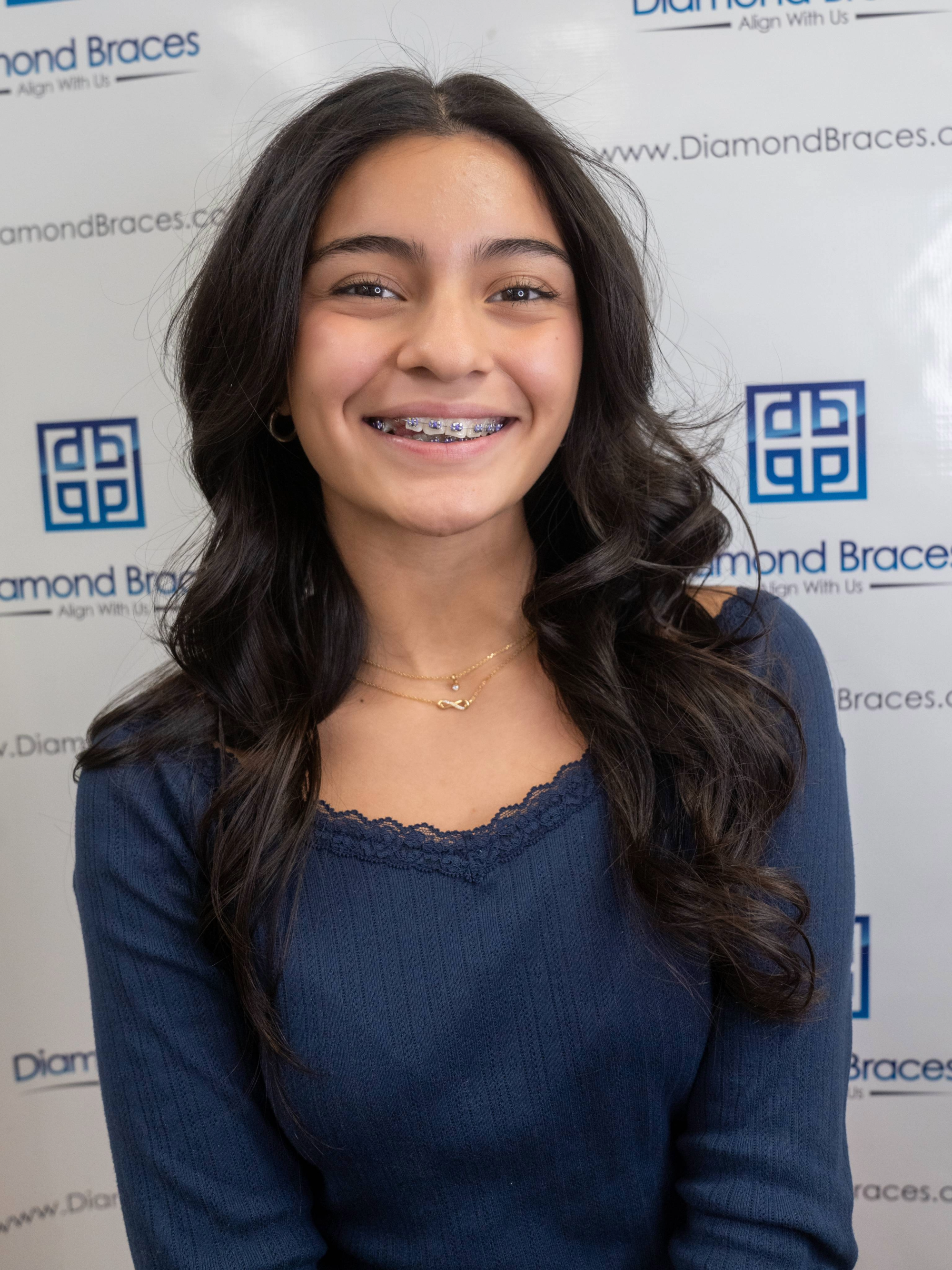 Smiling pediatric dentistry patient at diamond braces.