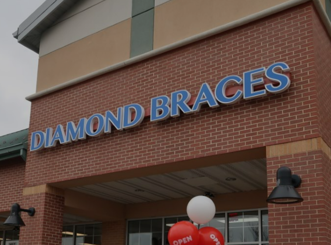 Brick building with Diamond Braces sign above entrance in Cinnaminson, New Jersey.