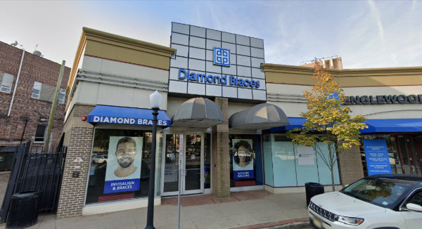 Diamond Braces dental clinic with a car parked outside in Englewood, New Jersey