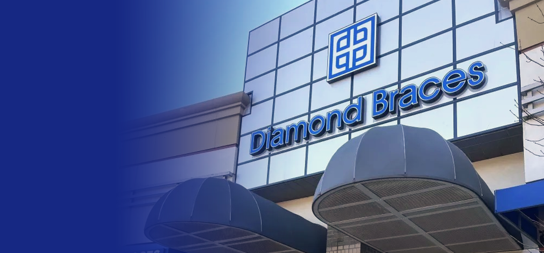 Diamond Braces dental office building with logo on a clear sky background.