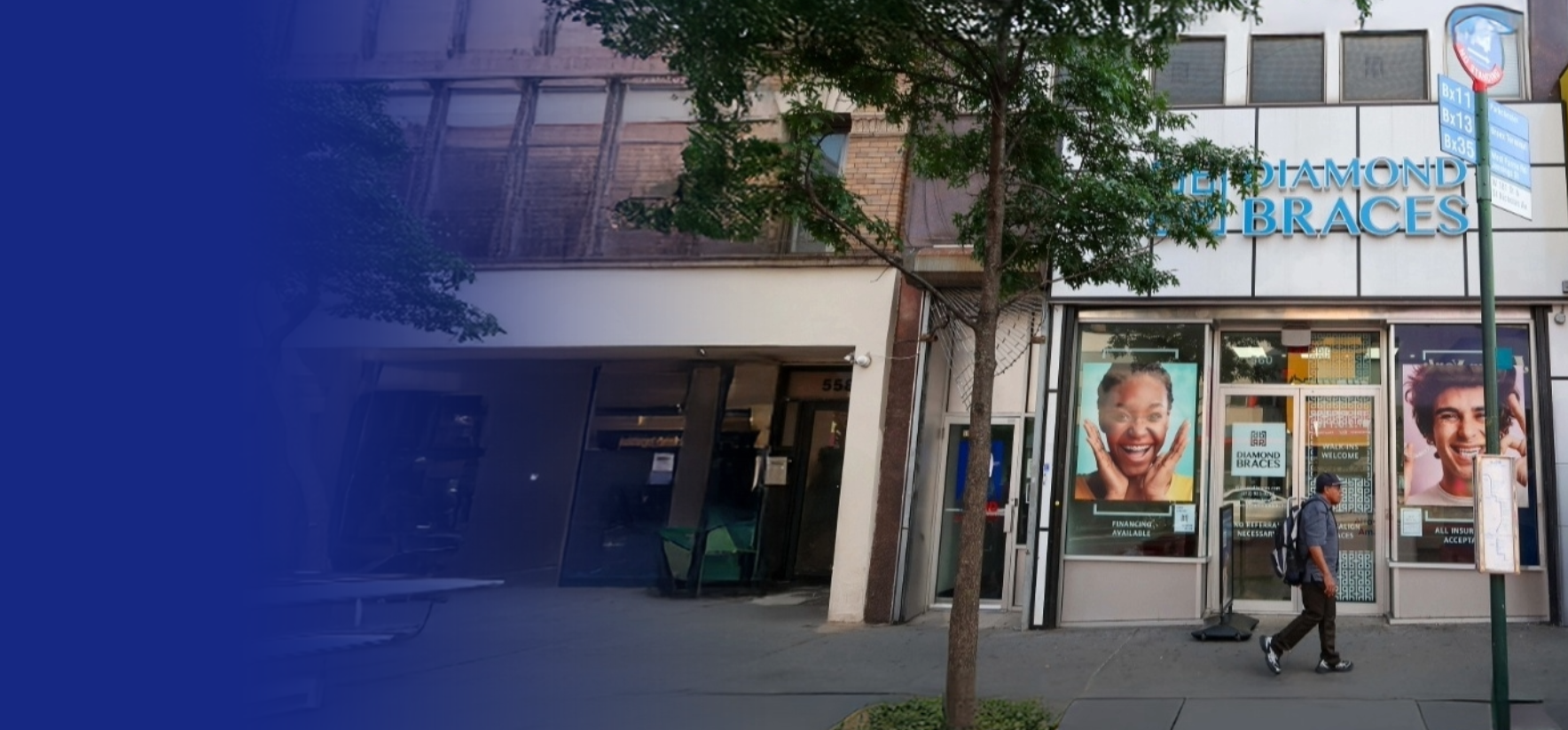 Building exterior with a sign for dental services like dental braces, Invisalign and a person walking by.