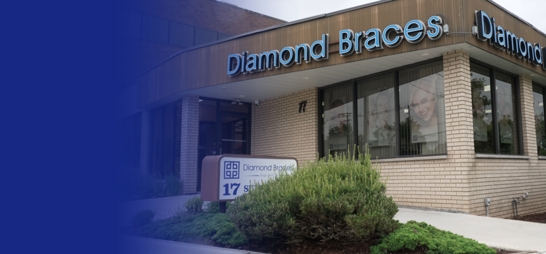 Diamond Braces dental office building with and large green bush with a sign behind it.