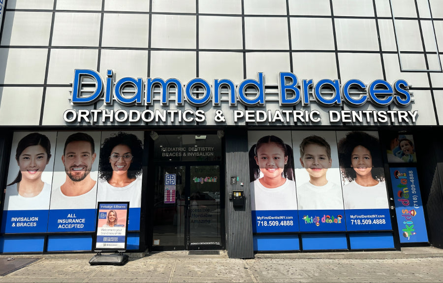Diamond Braces orthodontics and pediatric dentistry clinic entrance with promotional posters.