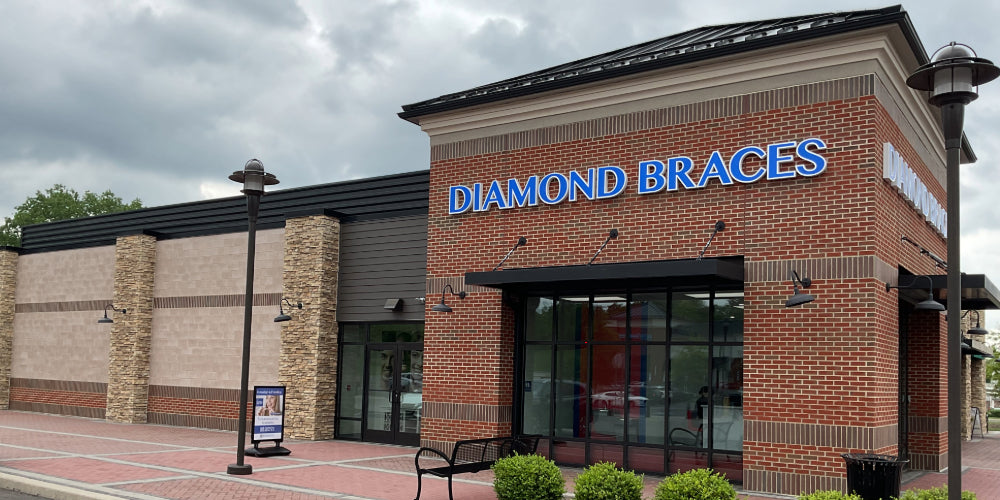 Diamond Braces dental office building with a cloudy sky.