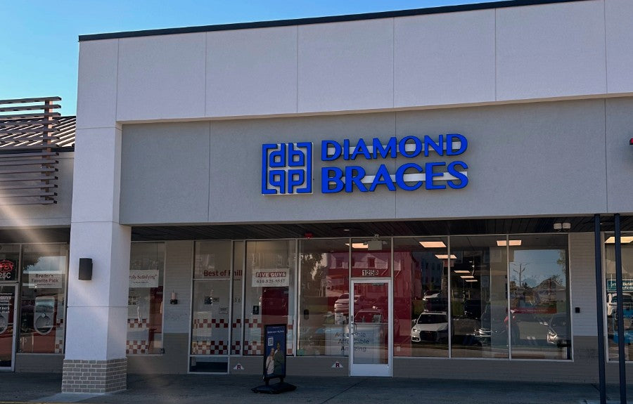 Diamond Braces dental clinic exterior with blue signage in Conshohocken, Pennsylvania.
