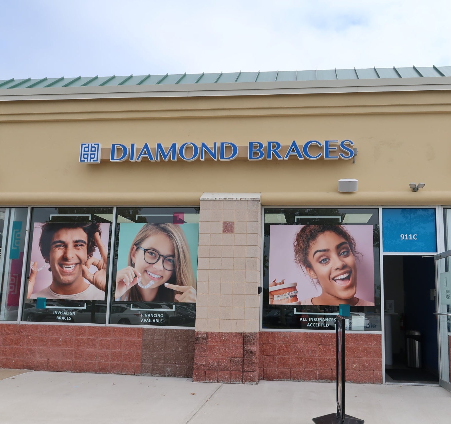 Diamond Braces dentist office with promotional posters on the exterior in South Plainfield, New Jersey.