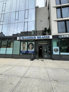 Image of a Diamond Braces dental office exterior on a Brooklyn street.