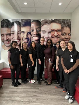 Image of orthodontic team taken inside of a Diamond Braces dental clinic.