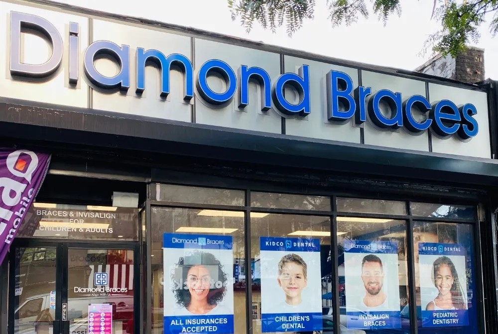 Diamond Braces dental office exterior with promotional posters on the window in the Bronx.