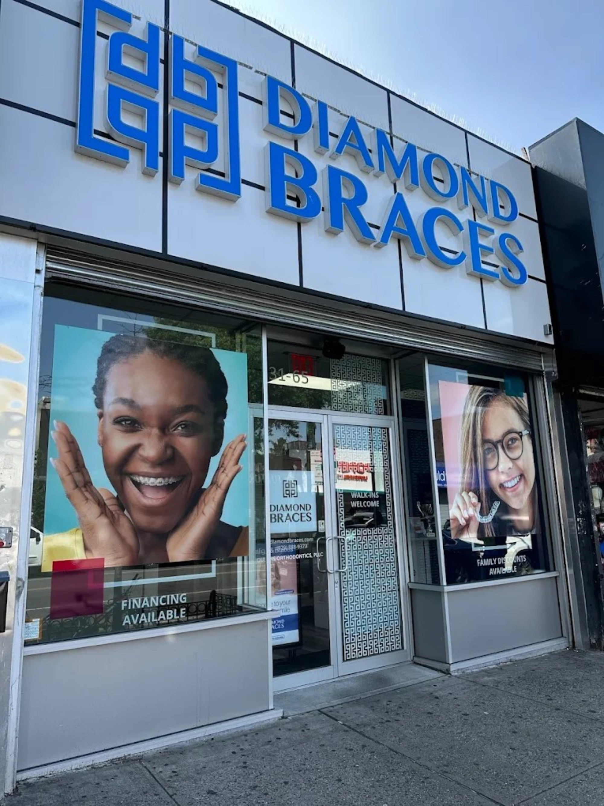 Diamond Braces dental office with promotional posters on the windows for Invisalign and braces for kids.